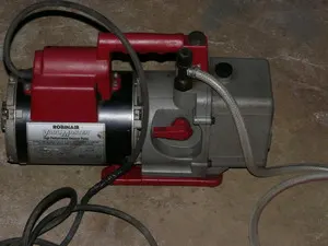 Vacuum pump Robinair (Fluid Equipment)